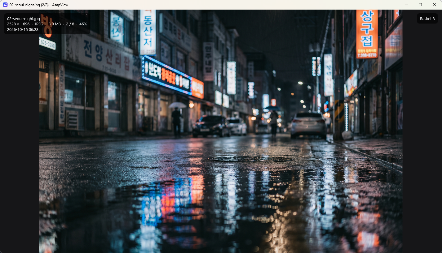 AsapView affichant une photo, avec dans un coin le nom du fichier, sa taille, sa position dans le dossier et le niveau de zoom